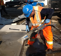 Cutting concrete at Target store with concrete chainsaw. Cutting concrete at target store with concrete chainsaw.